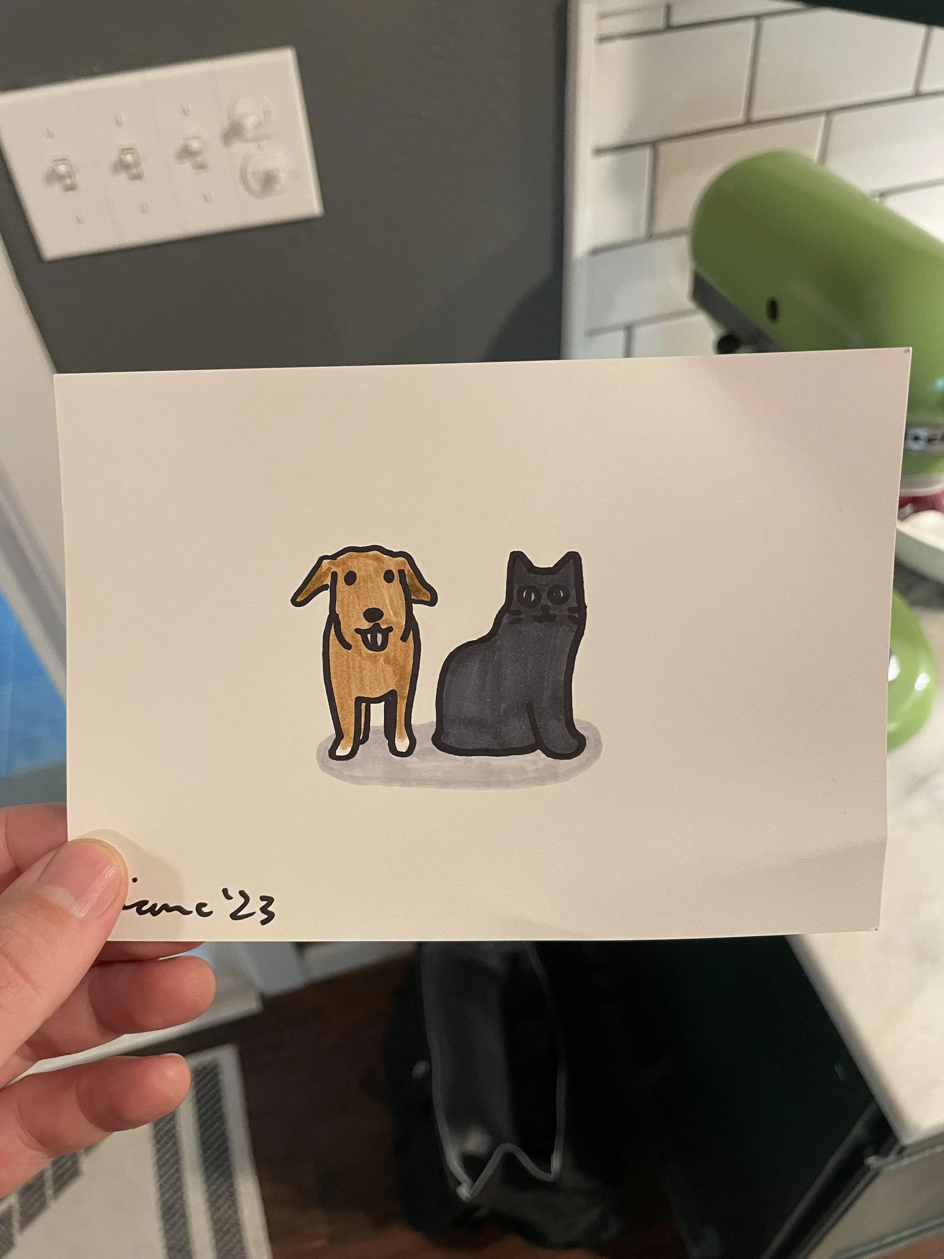 A drawn picture of a brown dog sitting to the left of a black cat